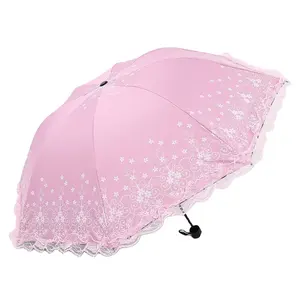 Sombrilla de lluvia soleada de color caramelo de encaje sombrilla de tres pliegues de moda creativa de niña de doble uso con encaje