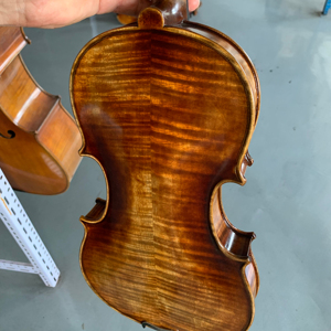 Violino Stile <span class=keywords><strong>Guarneri</strong></span> 4/4 con Top in Abete, Fondo in Acero Fiammato, Ottimo Suono, Vernice Spirit, Corde in Nylon, Ponticello di Qualità - Product Image 1