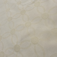 Tissu en polyester tricoté antidérapant jaune à texture florale en relief pour literie et housses de matelas