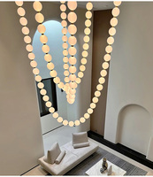 Lustres LED sur mesure d'usine, luminaires modernes en forme de collier long pour escaliers, idéaux pour salon, mariage, hôtel, grande suspension lumineuse