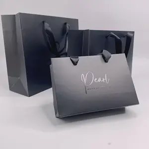 Logo personalizzato Bolsas De Regalo Sac En Papier Kraft Pas Cher Shopping Gift Bag Bolsa De Papel sacchetto di carta patinata