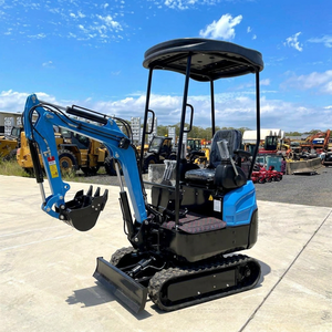 Mini-excavatrice compacte bleue sur chenilles avec cabine et chenilles, moteur et transmission haute performance - Product Image 1