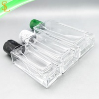 Bouteille de parfum vide transparente Rectangle portable vide 30 ml 50 ml 100 ml 3.4oz Bouteilles d'atomiseur de parfum en verre avec couvercles personnalisés