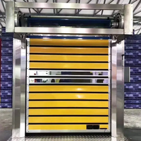 Porte électrique isolée ATMOS CE à enroulement rapide, rail en alliage d'aluminium, volet coupe-vent robuste pour entrepôts