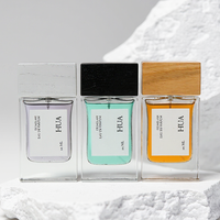 Botella de Perfume de Vidrio Minimalista de Lujo al por Mayor, Personalizada, de 30 ml y 50 ml, con Tapa de Madera, Logotipo Personalizado OEM Disponible