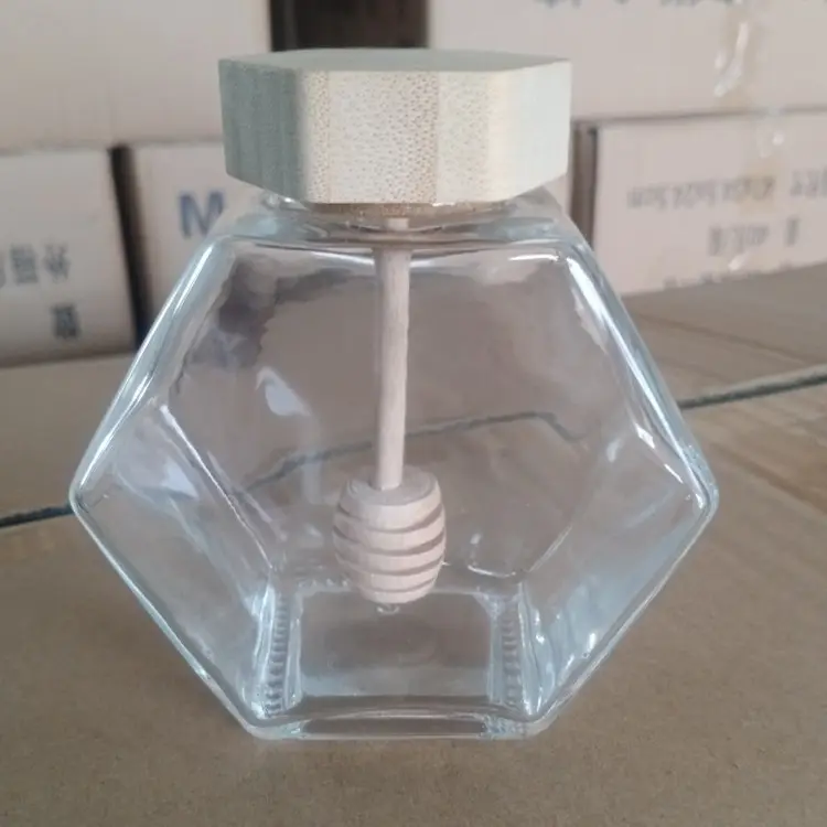 Factory direct sale honey bottle food grade empty glass hexagon jam jar with dipper