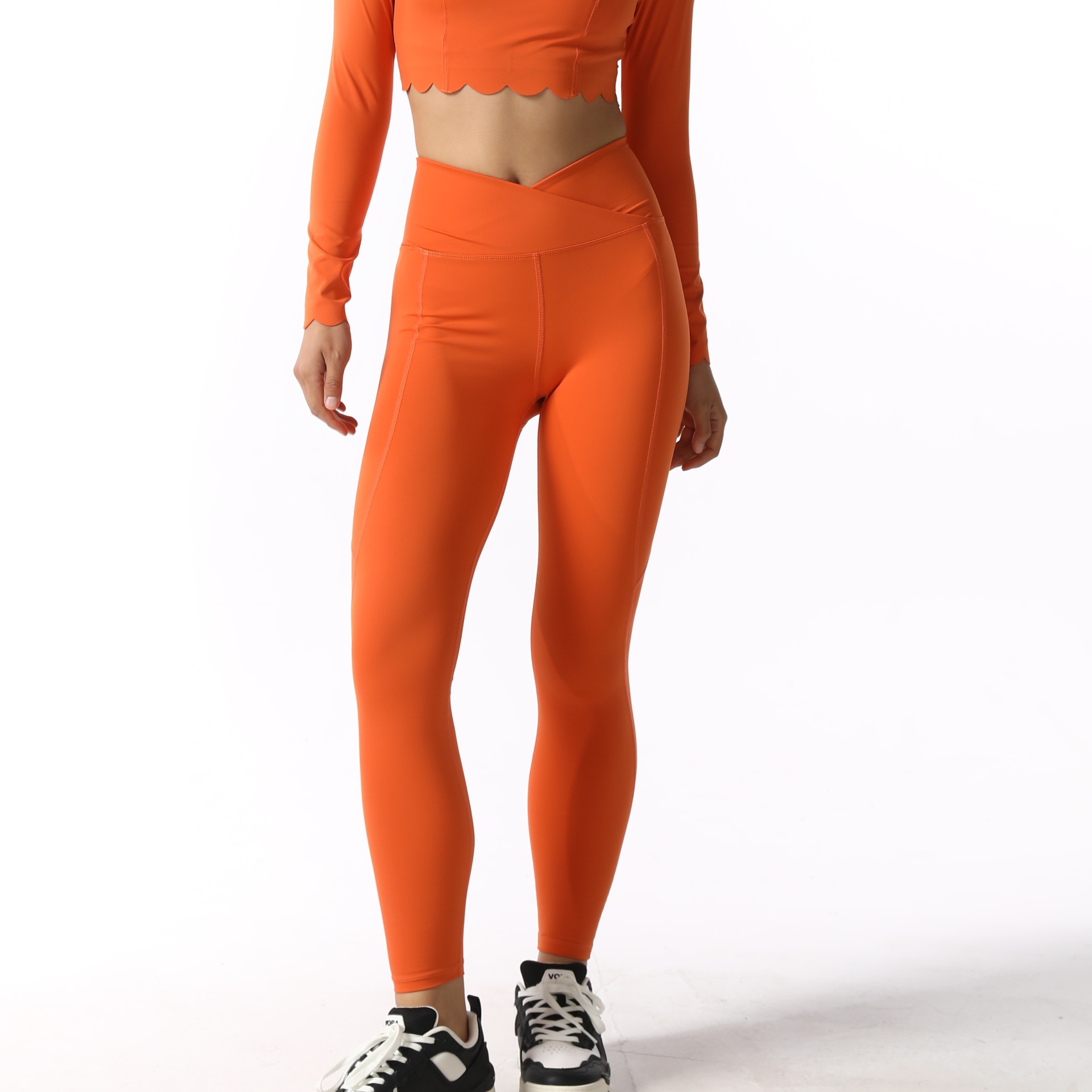 Pantalon taille en V orange coucher de soleil