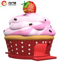 Château gonflable géant commercial en forme de cupcake à la fraise