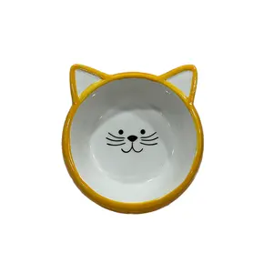 Alimentador de animais em forma de gato amarelo, premium, design de fundo plano, tigela de cerâmica vitrificada, bacia de água para animais de estimação, com padrão de gato fofo