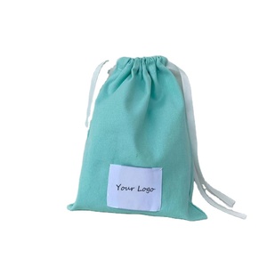 Pochette en mousseline de coton GOTS biodégradable avec cordon de serrage, impression de logo couleur personnalisée en usine, pour bijoux, bagues, boucles d'oreilles - Product Image 1