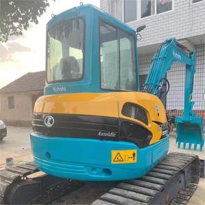 Excavatrice sur chenilles hydraulique Kubota KX155 d'origine japonaise utilisée pour les travaux d'aménagement paysager et la construction dans les espaces urbains étroits. - Product Image 6
