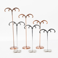 Organisateur de rangement pour boucles d'oreilles en métal avec crochets doubles courbés et base florale pour présentoir de bijoux de boutique