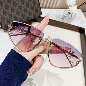 Gafas de sol ojo de gato sin marco de alta gama de diseñador de vacaciones de moda para mujer - Product Image 4