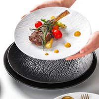 Assiette plate ronde en mélamine au design nordique et minimaliste, non toxique, pour les repas d'hôtel et la restauration commerciale