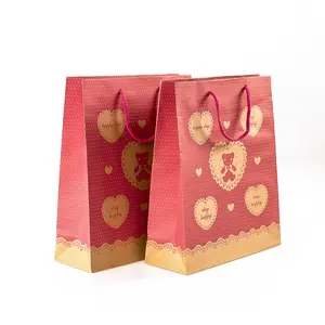 حقيبة هدايا ورقية بطبعة فاخرة كبيرة مخصصة لون بني صديقة للبيئة ورقية لعيد الميلاد بشعارك الخاص