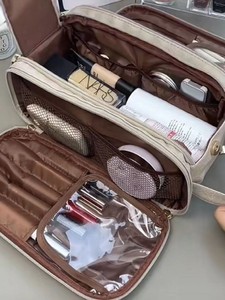 Sac de rangement cosmétique de voyage portable à grande capacité avec poignée souple à double fermeture éclair en PU imperméable à l'eau nouvelle mode transfrontalière - Product Image 6