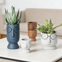Joli pot de fleurs en céramique en forme de visage avec un design de poupée pour la décoration de la maison et du jardin, ensemble de pots pour plantes succulentes sur le bureau