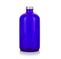 Bouteille en verre bleue en gros pour jus, boissons gazeuses, tequila, boissons à base de canne à sucre et jus fermentés