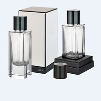 Emballage de bouteille de parfum en or de luxe personnalisé de 50ml 100ml avec bouchon magnétique et atomiseur et emballage sous pression