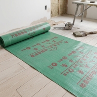 Tapis de protection pour sols, idéal pour la rénovation et le déménagement, résistant aux rayures, durable et sans résidus, pour carrelages et parquets.