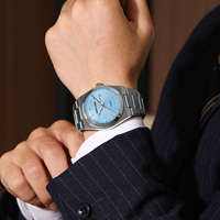 Montre pour homme avec logo personnalisé, grand cadran rond argenté et bleu, mouvement à quartz, acier inoxydable, calendrier, date, semaine, aiguilles lumineuses