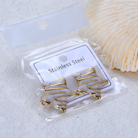 Boucles d'oreilles géométriques en acier inoxydable plaqué or 18 carats, polies et embossées, pour femmes, tendance occidentale, bijoux de niche haut de gamme, vente en gros, cadeaux