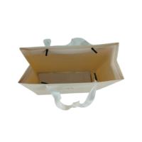 Sac de shopping en papier kraft de marque, surface mate, pour emballage cadeau en magasin de détail
