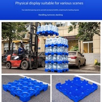 Palette en plastique industrielle simple face UGET Euro Rack à entrée 4 voies pour le stockage d'eau en bouteille dans une entrepôt frigorifique