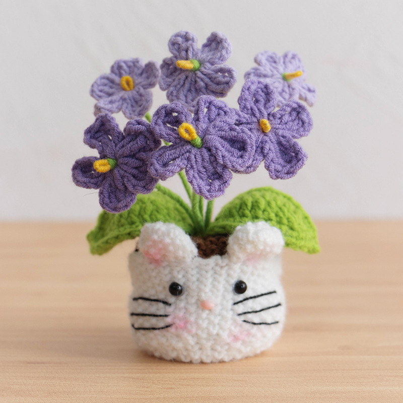 6 unidades de maceta con forma de gato y diseño de nomeolvides en degradado púrpura.