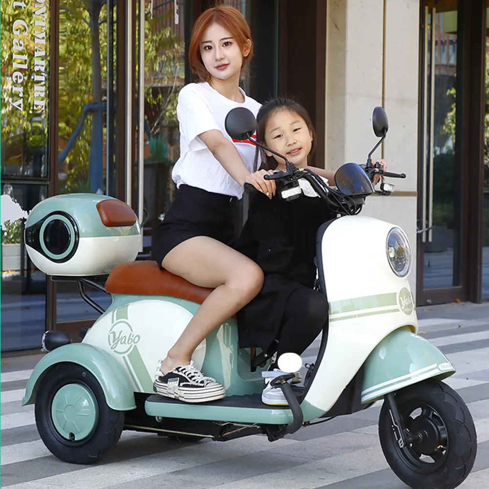 Thời trang xe đạp điện dễ thương xe máy V1 dành cho người lớn chu kỳ động cơ cha mẹ trẻ em phương tiện vận chuyển người già xe điện