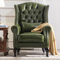 Nouveau best-seller : Fauteuil ottoman semi-circulaire en cuir style américain rétro, avec pieds en bois et rembourrage en éponge, pour salon.