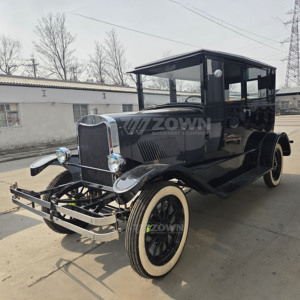 Auto Clásico Negro Vintage con Neumáticos Blancos Crema y Parrilla Cromada Vista Frontal - Product Image 6