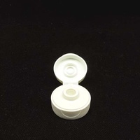 Bouchon blanc 38/400 en PP avec valve en silicone pour gel douche et lotion, avec système d'étanchéité et de distribution contrôlée anti-fuite