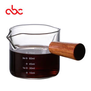 Taza Medidora con Doble Boquilla, Taza para Espresso, Taza para Leche, Vaso Transparente Redondo con Asa de Madera - Product Image 1