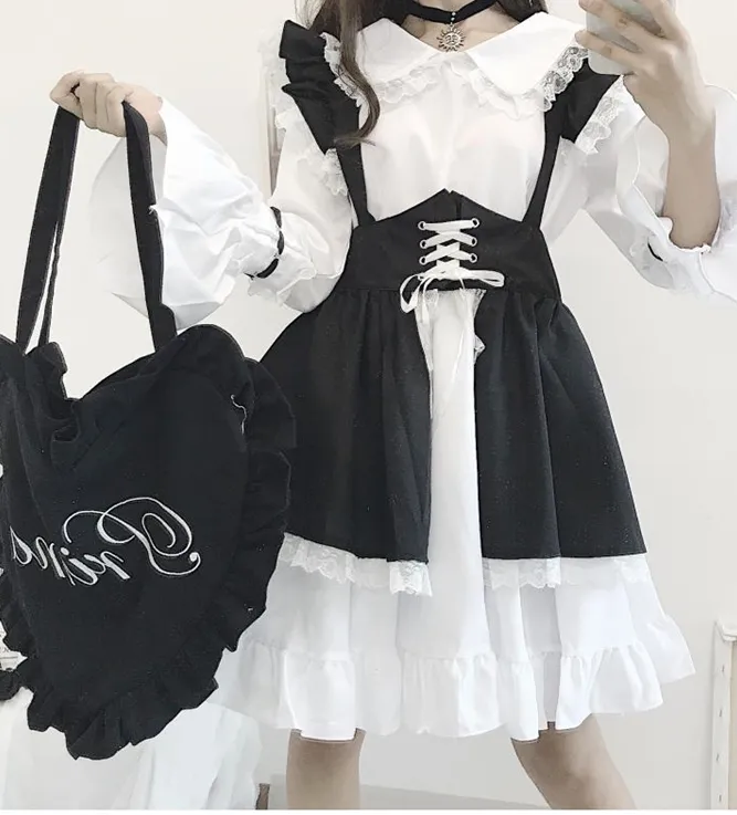 Abito dolce Lolita in stile giapponese abito da cameriera da donna in bianco e nero abito da festa gotico abiti da donna a manica svasata