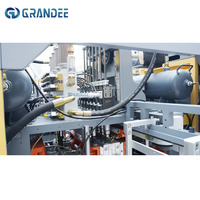 Machine de soufflage automatique de bouteilles en plastique PET, machine de fabrication de bouteilles à vitesse réglable et à pas variable
