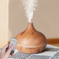 Diffuseur d'aromathérapie à ultrasons en grain de bois télécommandé avec 7 couleurs de lumière Humidificateur d'aromathérapie 500ml Grand volume de brume