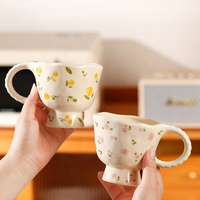 Tasses en céramique florales modernes au design frais et délicat pour le petit-déjeuner domestique ou les tasses à café à haute apparence.