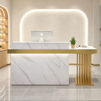 Comptoir de réception en marbre de luxe léger avec cadre métallique doré, comptoir d'accueil moderne pour salon de beauté et spa, OEM
