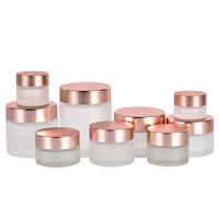 Emballage cosmétique vide OEM en verre givré transparent mat avec couvercle rose doré pour crème pour le visage