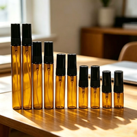 Vente en gros de mini flacons cylindriques de luxe en verre ambré pour échantillons de parfum, atomiseurs à bouchon à vis, 2ml 3ml 5ml 10ml, emballage vide pour huiles
