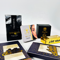 Boîtes d'emballage personnalisées noires et dorées en gros avec impression étoilée et fenêtre découpée pour bougies de massage et chocolats gourmands