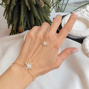 Pulsera de mano con diseño de estrella y circonitas cúbicas para mujer, ideal para bodas, venta al por mayor - Product Image 1