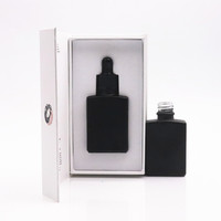 Emballage d'huile essentielle de luxe 30ml 50ml 100ml Cosmétique Yeux Noir mat Sérum Flacon compte-gouttes en verre avec boîte