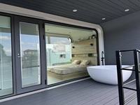 WE Cabine capsule moderne de luxe de 40 pieds Maison conteneur modulaire préfabriquée en acier pour le sommeil en plein air Villa ou hôtel Petite maison mobile