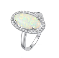 Nouvelle conception, bague de fiançailles en argent sterling 925, bijoux en argent charmants, grande taille, coupe ovale, opale bleue synthétique, halo