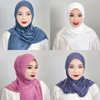 Vente en gros de hijabs de haute qualité, couleurs unies avec perles, foulards traditionnels conservateurs pour femmes, châles du Moyen-Orient, Dubaï
