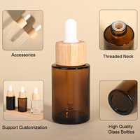 Botol Kaca Pipih 20ml 30ml Custom dengan Cincin Bambu dan Pipet Tetes untuk Kemasan Kosmetik, Minyak Rambut, dan Esens - Promo Hot Sale