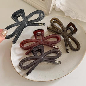 Nouvelle pince à cheveux creuse en forme de nœud, grande pince requin en plastique pour femmes, vente en gros - Product Image 2