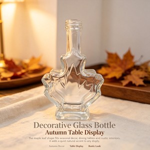Bouteille en verre mat exquise en forme de feuille d'<span class=keywords><strong>érable</strong></span> personnalisée de 100 ml avec bouchon <span class=keywords><strong>à</strong></span> vis pour les spiritueux comme la vodka, le whisky, le gin, le brandy, le <span class=keywords><strong>rhum</strong></span> - Product Image 3